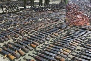 an image of old, rusty ak47s